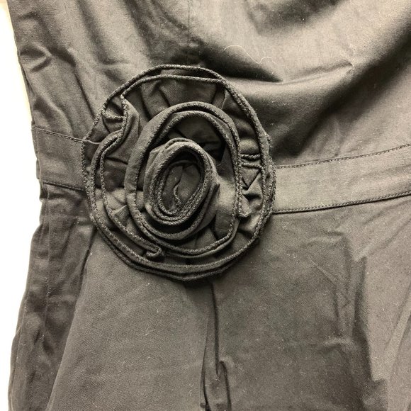 Black Dress with a Statement Flower - Picture 2 of 6